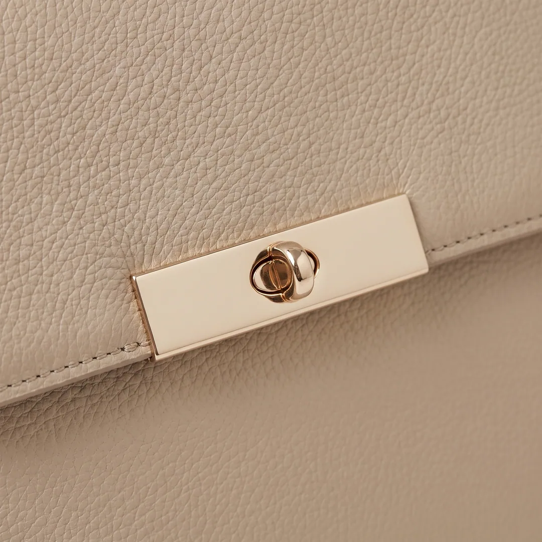 Macro of the champagne VELAR bar clasp
